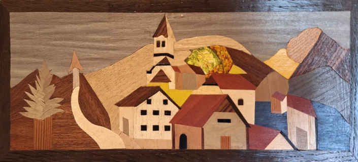Lussari 2, quadro intarsiato in legno del Monte Lussari di Mario Belardi